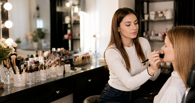 Professional beautician providing luxury facial service at home